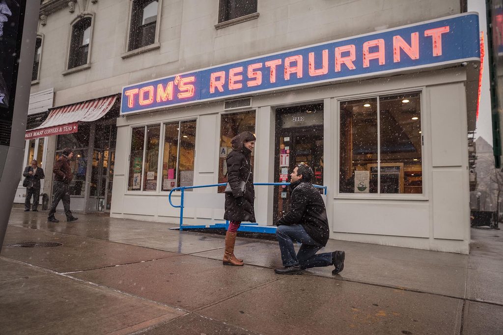 Marriage proposal outside Tom's Restaurant in New York