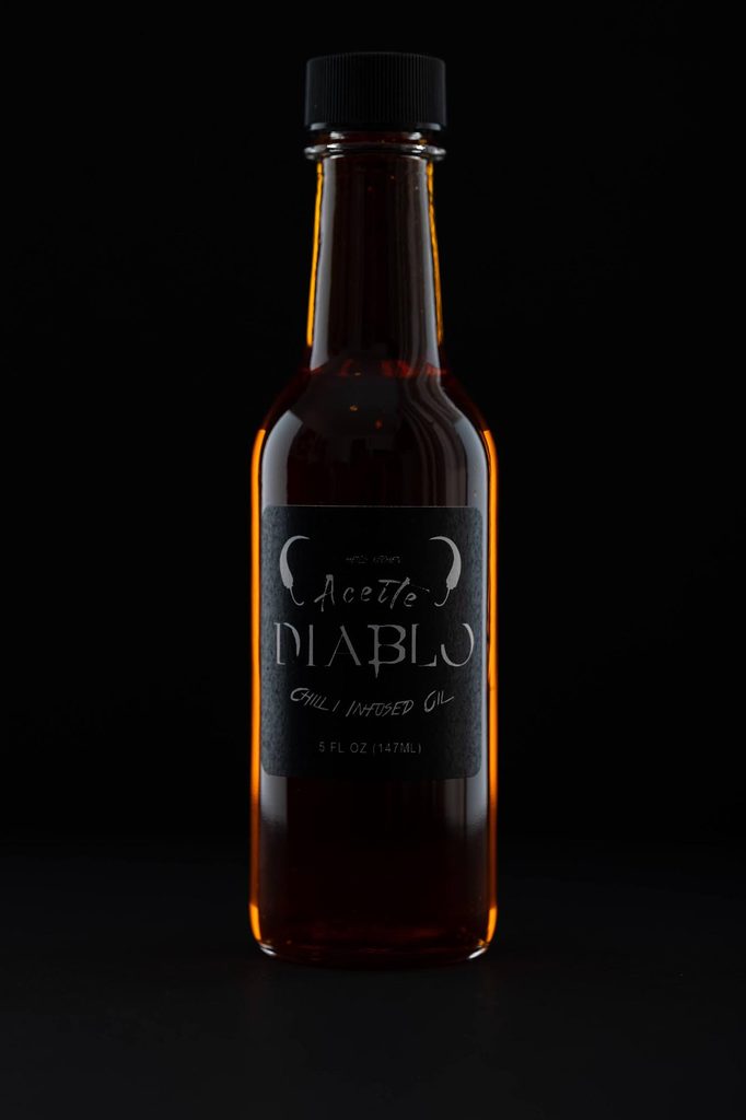 Commercial product photograph of hot sauce bottle