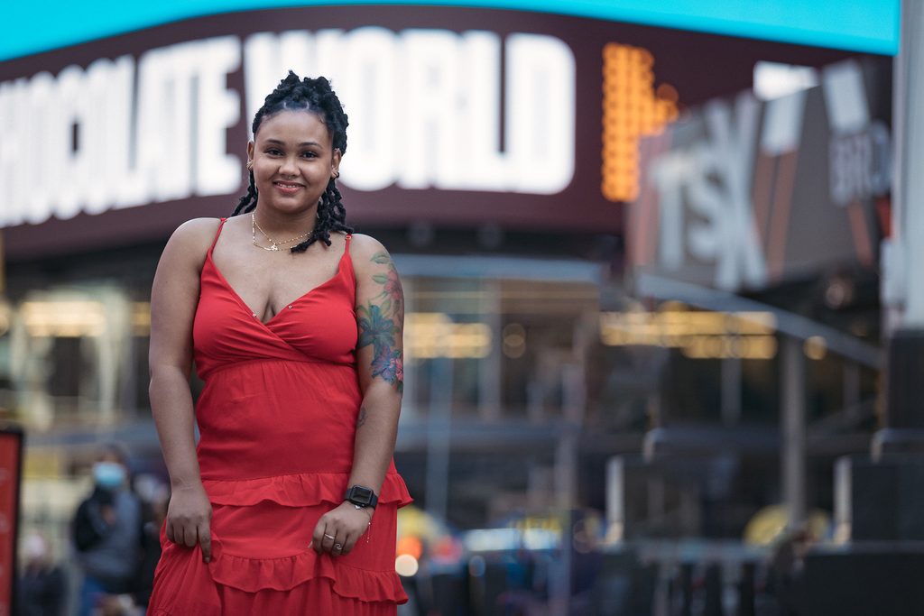 Editorial portrait of woman in Times Square