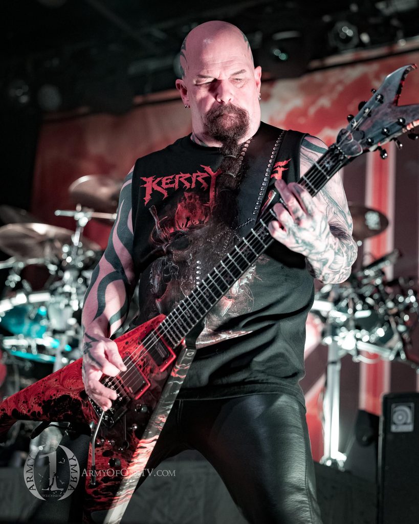 Metal guitarist performing live on stage